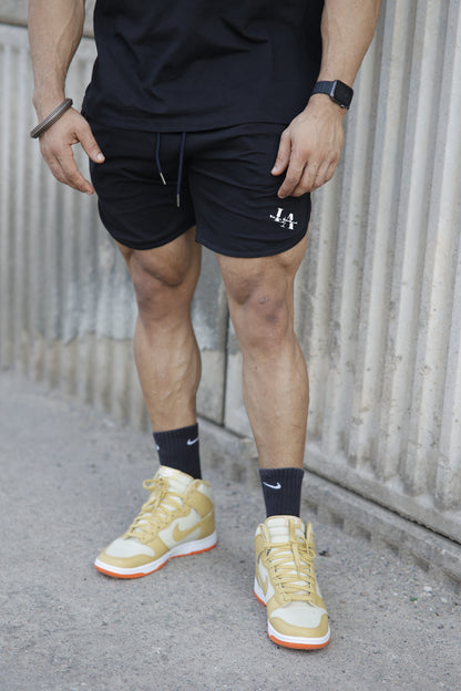 SUMMER SURVIVAL BLACK SHORTS